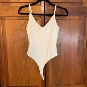 Lulus cream body suit! Worn once. Size large!